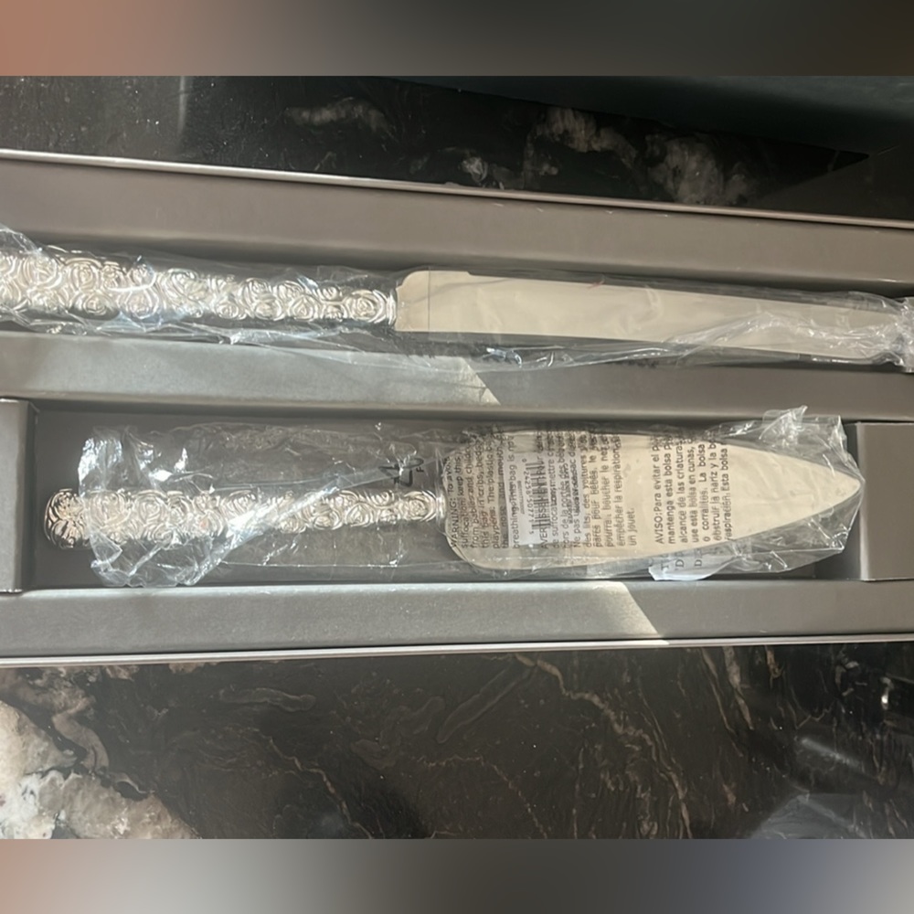 Never been used Waterford  cake knife and server